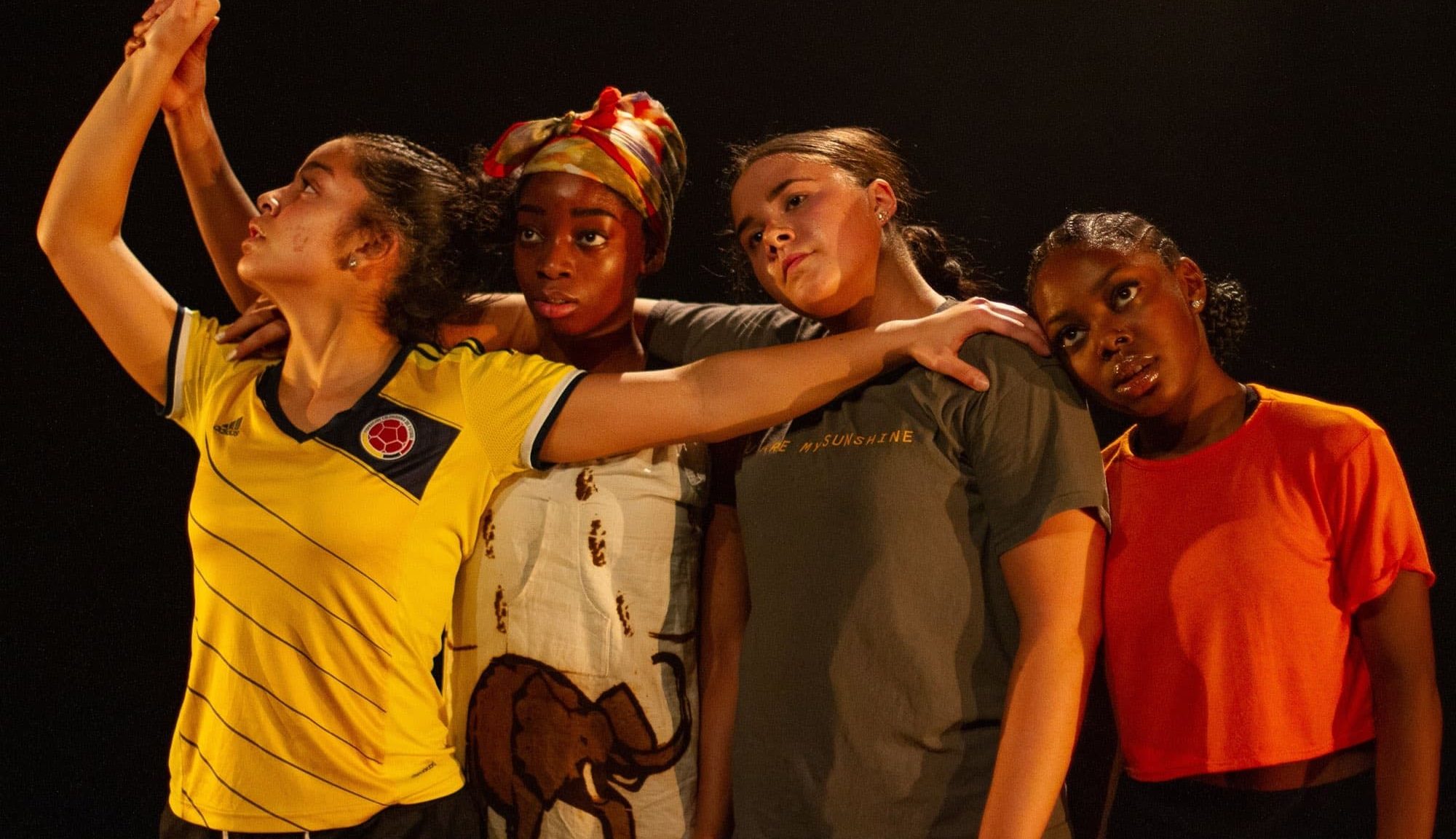 who we are 4 girls performing